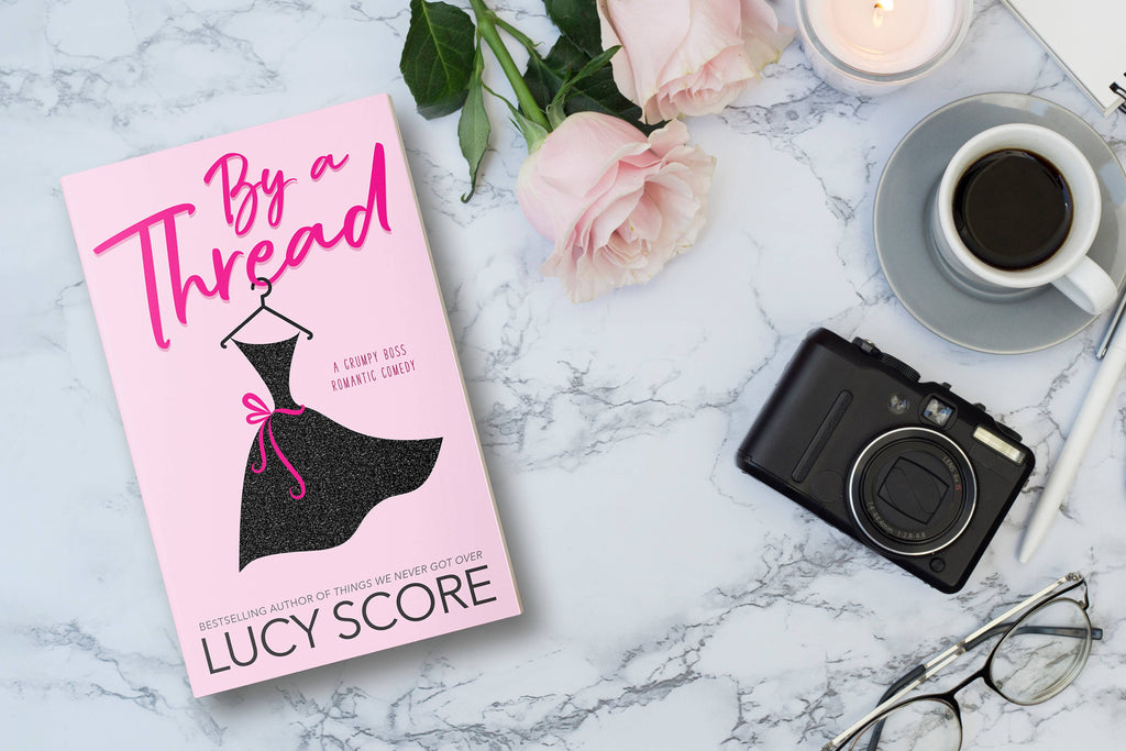 By a Thread : Lucy Score